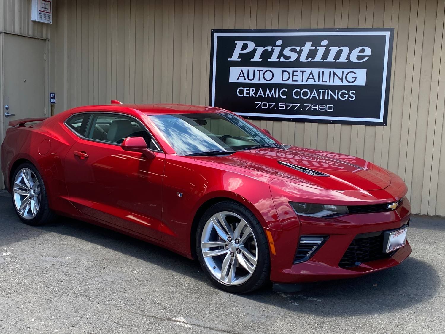 Red Chevrolet Camaro after ceramic coating installation