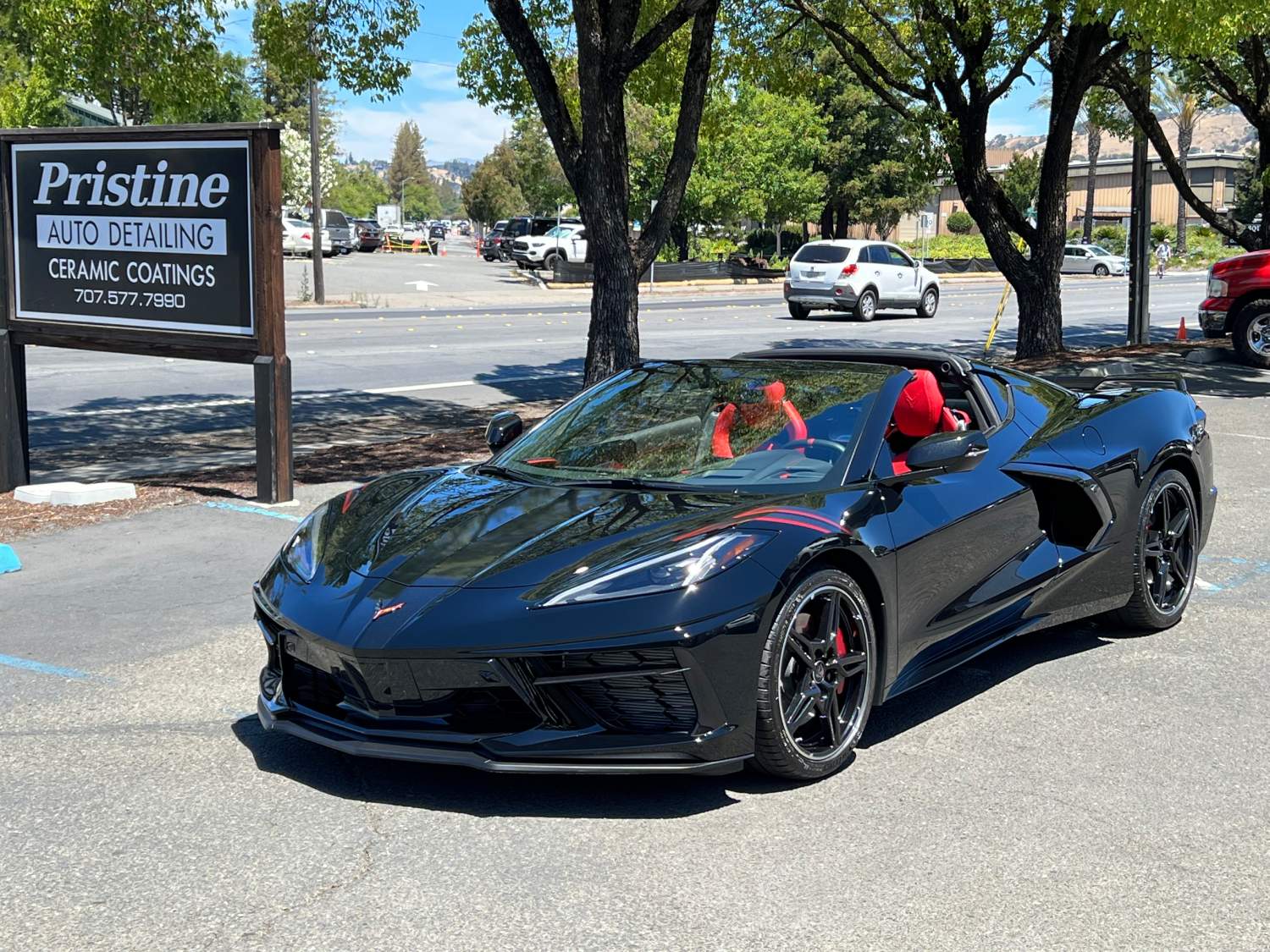 Black convertible C8 after ceramic coating installation